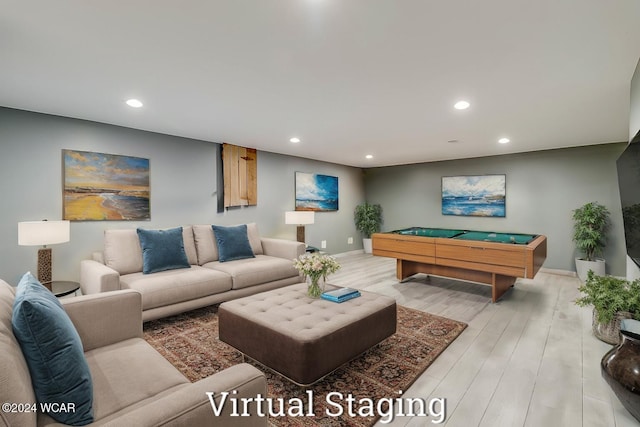 living room with pool table and light wood-type flooring