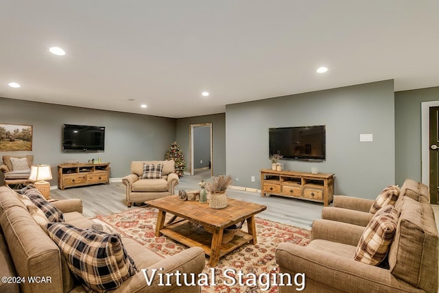 living room with light hardwood / wood-style floors