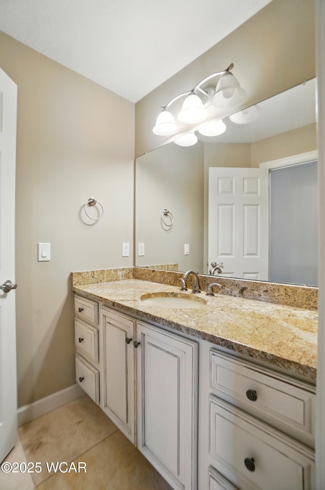 4441 Indian Hill Dr, Lima, OH 45806 - bathroom with vanity, baseboards, and tile patterned floors