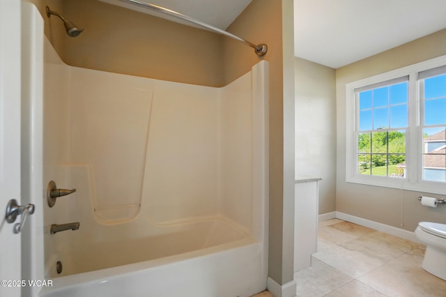 4441 Indian Hill Dr, Lima, OH 45806 - bathroom with baseboards, toilet, and bathtub / shower combination