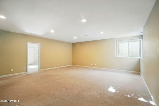 4441 Indian Hill Dr, Lima, OH 45806 - spare room featuring light colored carpet, baseboards, and recessed lighting