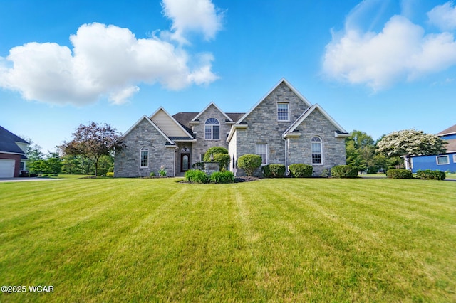 4441 Indian Hill Dr, Lima, OH 45806 - view of front facade featuring a front lawn and stone siding