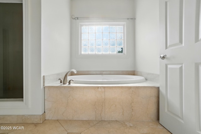 4441 Indian Hill Dr, Lima, OH 45806 - full bathroom featuring a garden tub and tile patterned floors