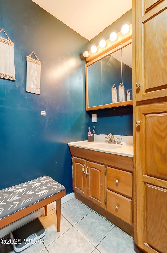 bathroom with vanity and tile patterned floors