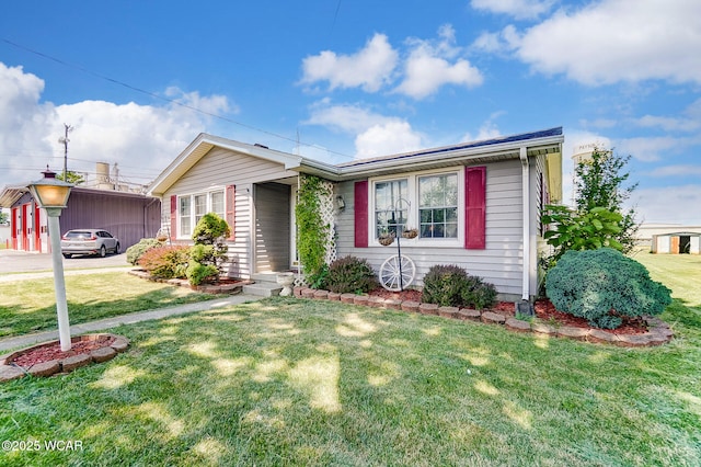 view of front of house featuring a front yard and a carport