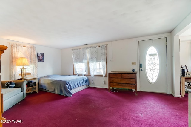 bedroom with dark carpet