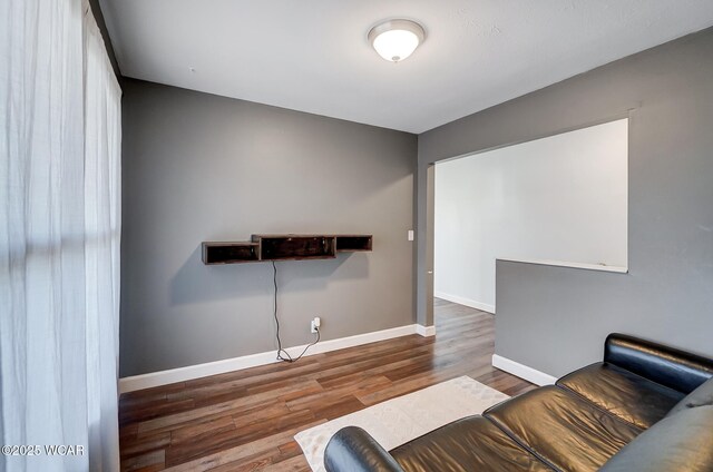 1280 Wonderlick Rd, Lima, OH 45805 - living area featuring wood finished floors and baseboards