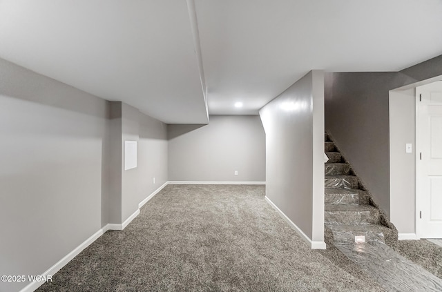 basement featuring carpet flooring