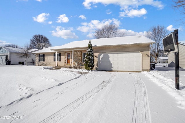 ranch-style home featuring an attached garage