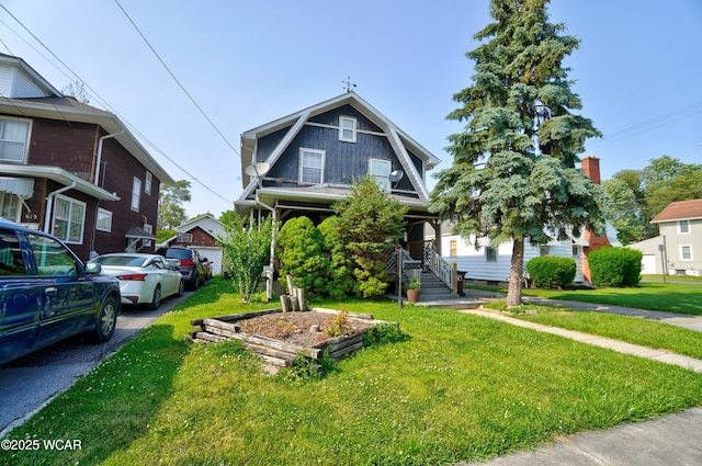 608 W Grand Ave, Lima, OH 45801 - view of front facade with a front yard