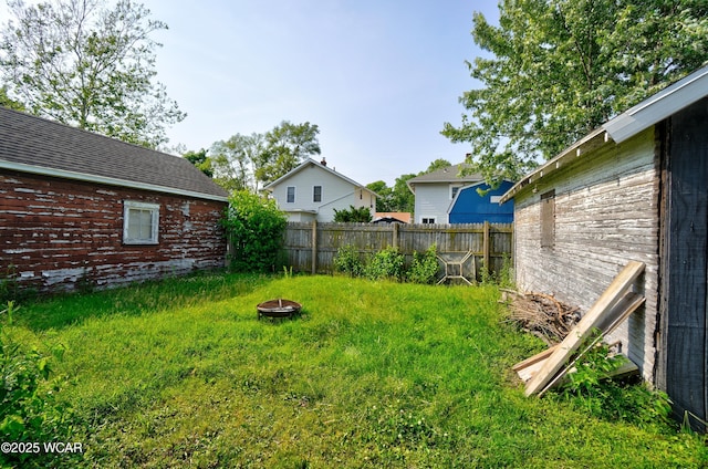 608 W Grand Ave, Lima, OH 45801 - view of yard with an outdoor fire pit