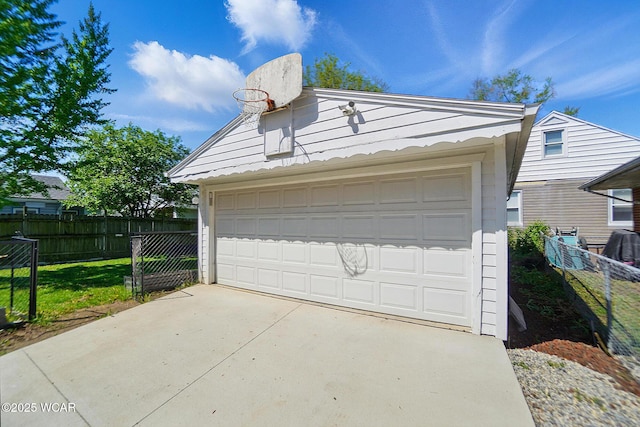 garage with fence