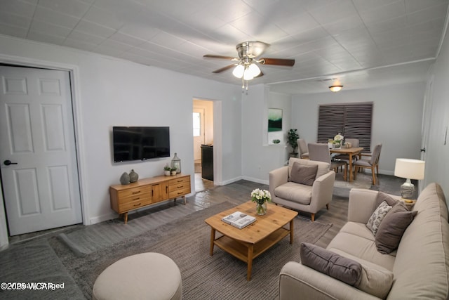618 N Rosedale Ave, Lima, OH 45805 - living room featuring baseboards and ceiling fan