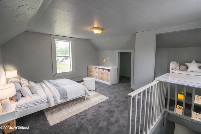 618 N Rosedale Ave, Lima, OH 45805 - carpeted bedroom featuring vaulted ceiling