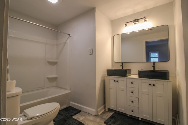 618 N Rosedale Ave, Lima, OH 45805 - full bath with toilet, double vanity, washtub / shower combination, and baseboards
