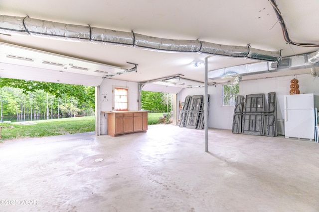 1380 Thomas Rd, New Paris, OH 45347 - garage featuring freestanding refrigerator