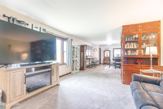 1380 Thomas Rd, New Paris, OH 45347 - carpeted living room featuring baseboards