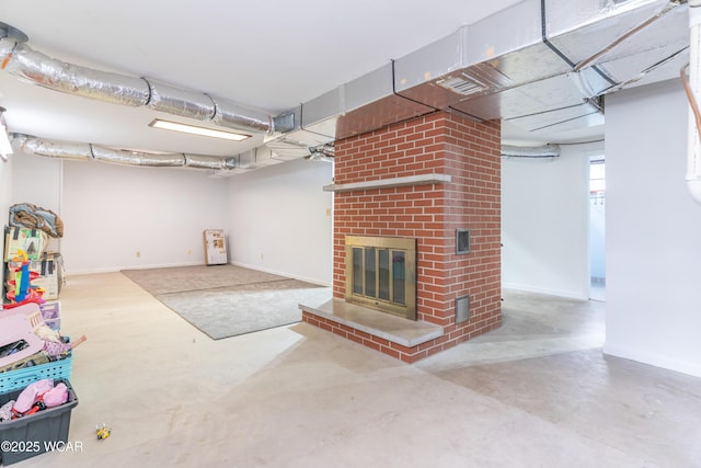 1380 Thomas Rd, New Paris, OH 45347 - below grade area featuring a fireplace and baseboards