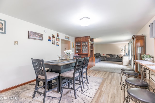 1380 Thomas Rd, New Paris, OH 45347 - dining area featuring light wood-style floors