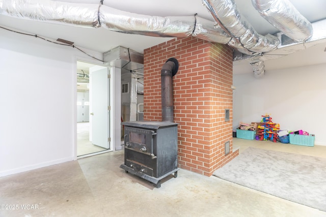 1380 Thomas Rd, New Paris, OH 45347 - below grade area with a wood stove