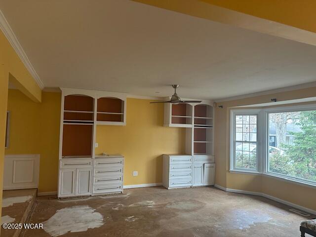 interior space with crown molding