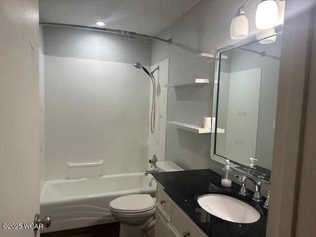 full bathroom with vanity,  shower combination, and toilet