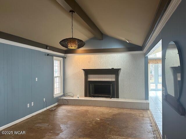 unfurnished living room featuring lofted ceiling with beams