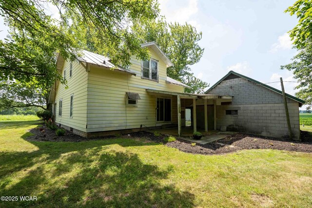 15350 State Route 235, Mount Cory, OH 45868 - back of property featuring a yard and a patio area