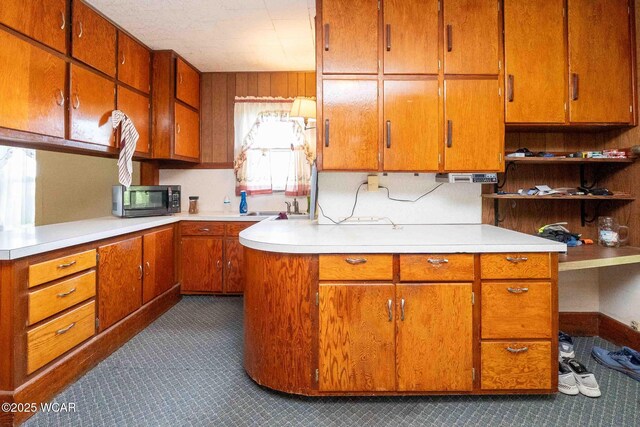15350 State Route 235, Mount Cory, OH 45868 - kitchen featuring black microwave, light countertops, and brown cabinets