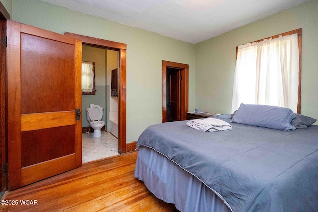 15350 State Route 235, Mount Cory, OH 45868 - bedroom featuring light wood finished floors and ensuite bathroom