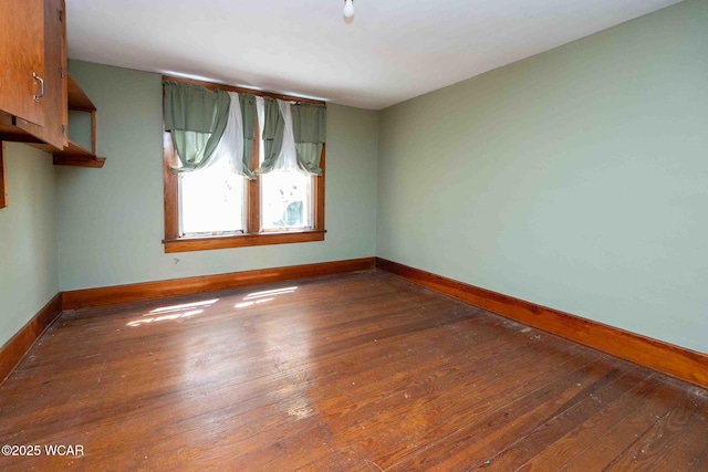 15350 State Route 235, Mount Cory, OH 45868 - unfurnished room featuring baseboards and wood-type flooring