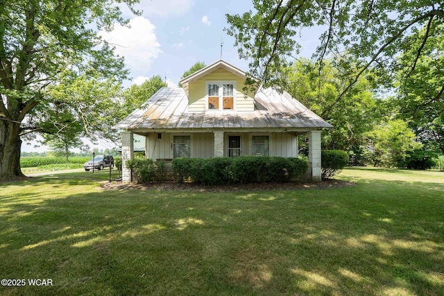 15350 State Route 235, Mount Cory, OH 45868 - bungalow featuring a front yard and board and batten siding