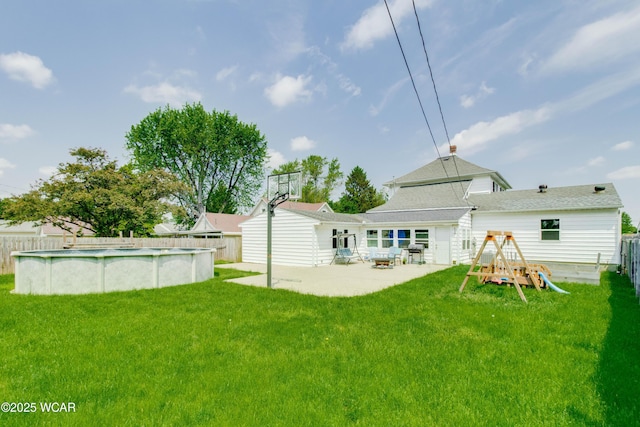 213 Johns Ave, Elida, OH 45807 - rear view of house featuring a patio area