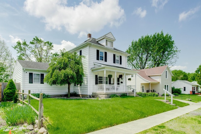 213 Johns Ave, Elida, OH 45807 - view of front of property featuring a porch and a chimney
