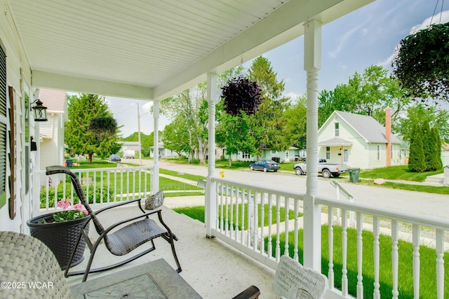 213 Johns Ave, Elida, OH 45807 - view of patio / terrace featuring covered porch and a residential view