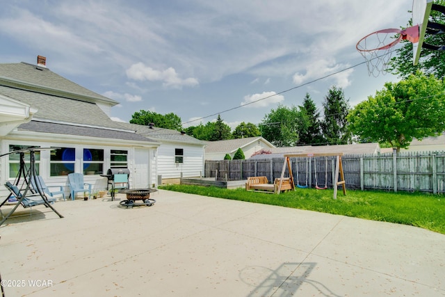 213 Johns Ave, Elida, OH 45807 - view of patio / terrace featuring an outdoor fire pit