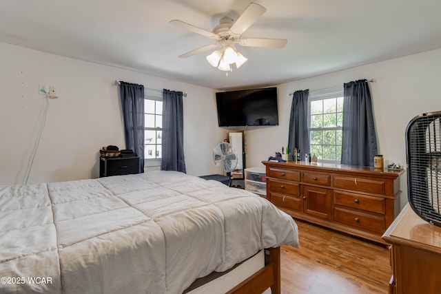 213 Johns Ave, Elida, OH 45807 - bedroom with light wood-style floors and a ceiling fan