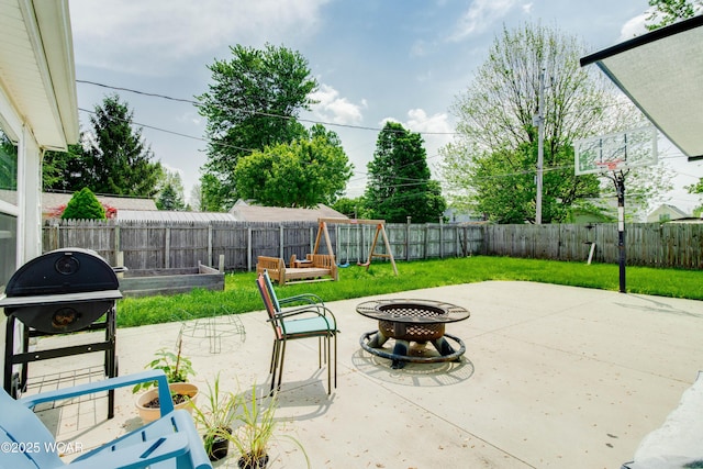 213 Johns Ave, Elida, OH 45807 - view of patio / terrace with a fire pit and a vegetable garden