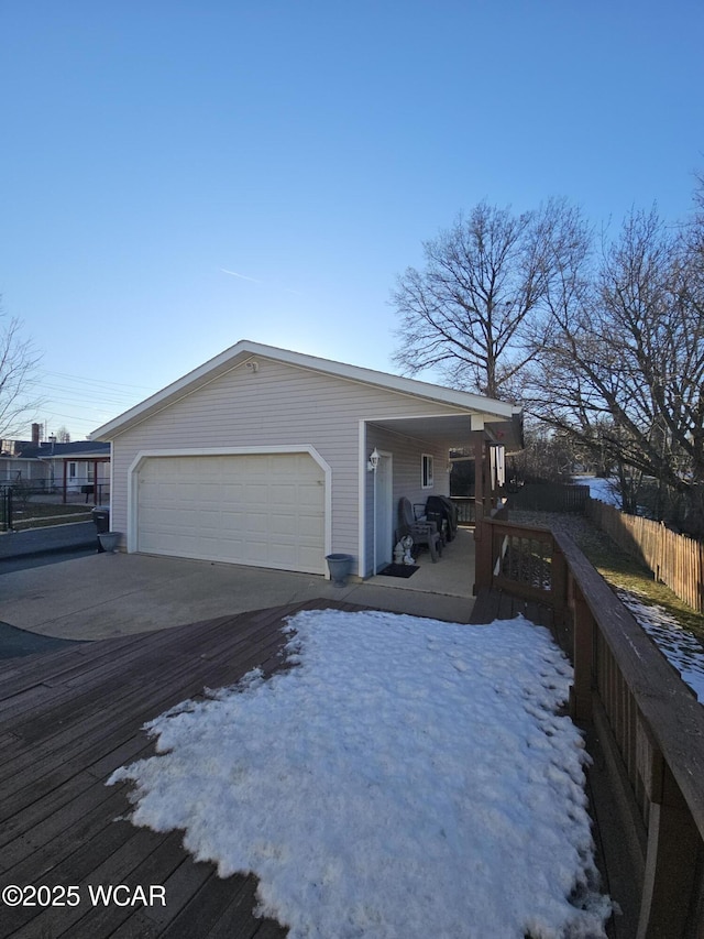 view of home's exterior featuring a garage and covered porch