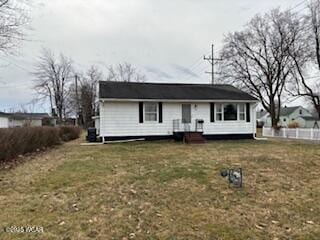 view of front of home with a front lawn