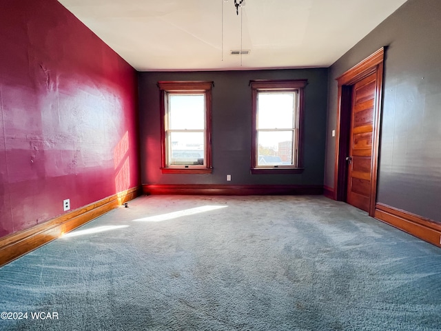 empty room featuring carpet floors