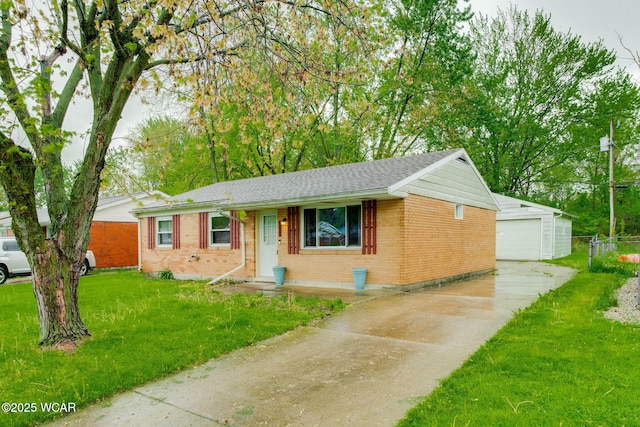 1153 Bahama Dr, Lima, OH 45801 - single story home featuring a front lawn, brick siding, roof with shingles, and an outbuilding
