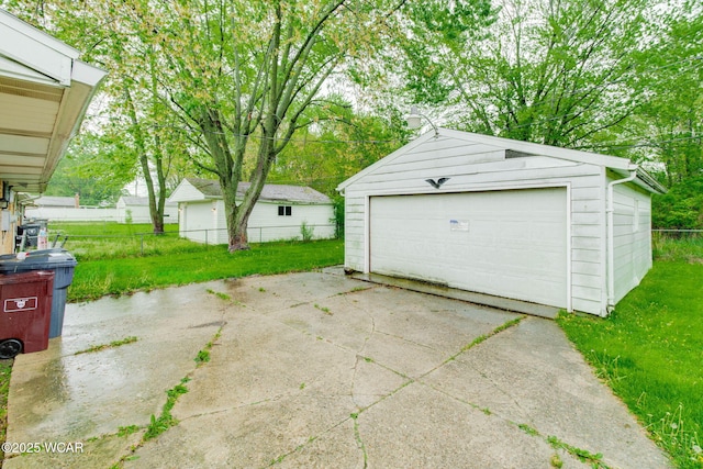1153 Bahama Dr, Lima, OH 45801 - detached garage featuring fence