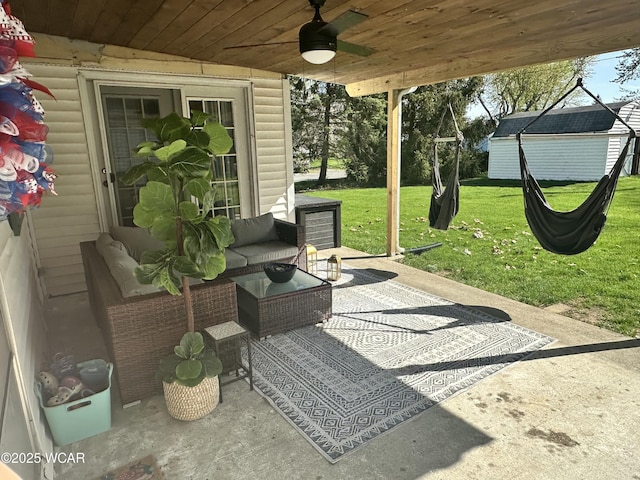 view of patio featuring ceiling fan