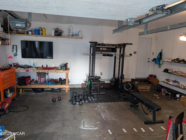 garage with a workshop area