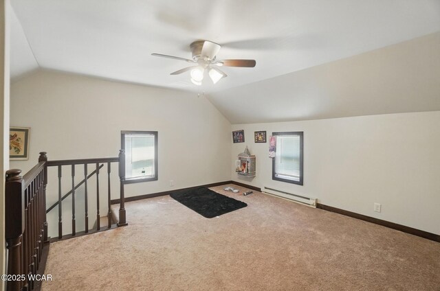 118 S Wagner Ave, Wapakoneta, OH 45895 - additional living space featuring a baseboard radiator, lofted ceiling, carpet floors, and ceiling fan