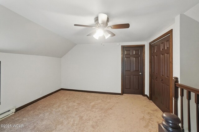 118 S Wagner Ave, Wapakoneta, OH 45895 - additional living space featuring baseboards, carpet, baseboard heating, and ceiling fan
