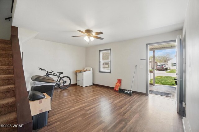 118 S Wagner Ave, Wapakoneta, OH 45895 - interior space featuring stairway, a ceiling fan, wood finished floors, washer / dryer, and baseboards