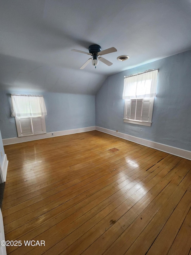 11205 Rd Z, Columbus Grove, OH 45830 - additional living space with a ceiling fan, lofted ceiling, and hardwood / wood-style floors