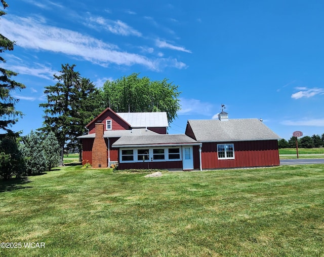 11205 Rd Z, Columbus Grove, OH 45830 - view of front facade with a front lawn and a shingled roof